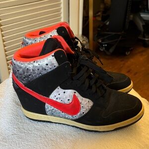 Wedge Nike Dunks

Stylish Black and Red Women's High-Top Sneakers